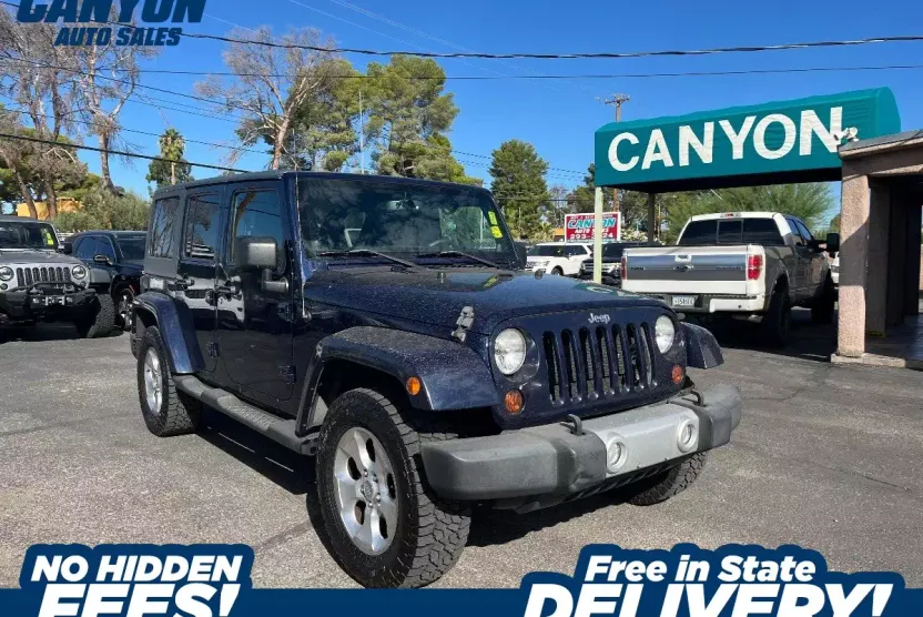 2013 Jeep Wrangler Unlimited Sahara photo 1