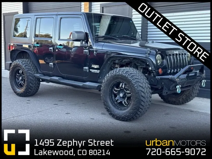 2013 Jeep Wrangler Unlimited Sahara photo 1