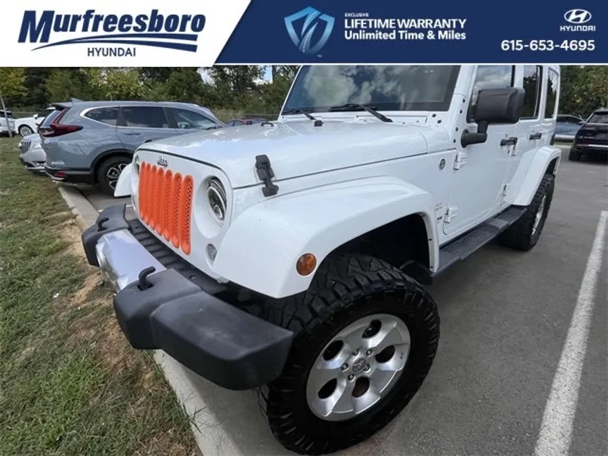 2015 Jeep Wrangler Unlimited Sahara photo 1