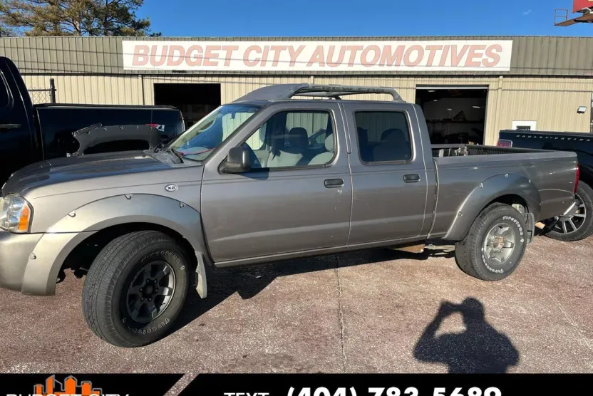 2003 Nissan Frontier XE Crew Cab photo 1