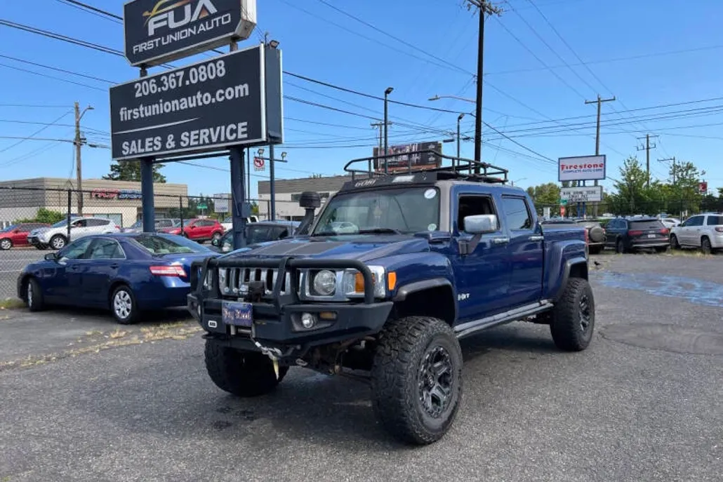 2009 Hummer H3T 1/2 Ton photo 1