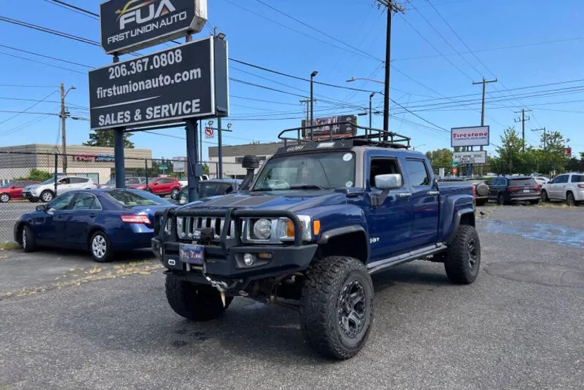 2009 Hummer H3T 1/2 Ton photo 1