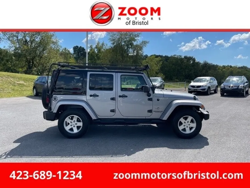 2014 Jeep Wrangler Unlimited Freedom photo 1