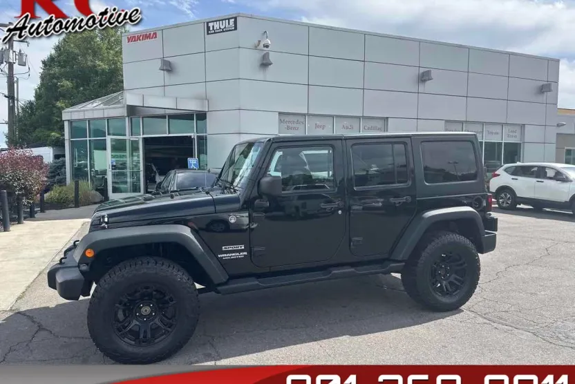 2013 Jeep Wrangler Unlimited Sport photo 1