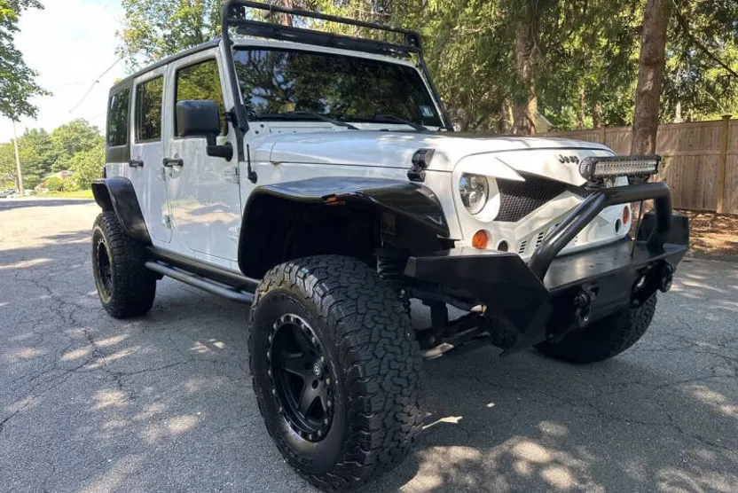 2013 Jeep Wrangler Unlimited Sport photo 1