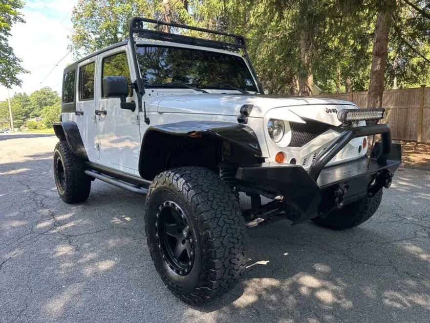 2013 Jeep Wrangler Unlimited Sport photo 1