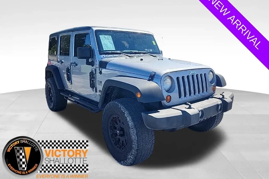 2013 Jeep Wrangler Unlimited Sport photo 1