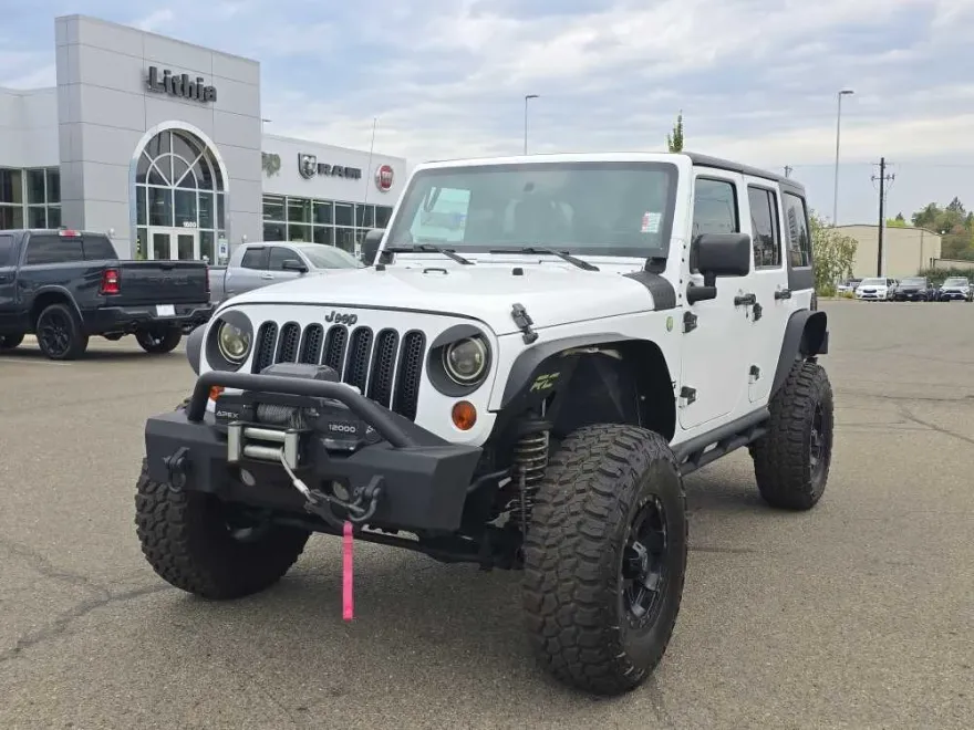 2013 Jeep Wrangler Unlimited Sport photo 1