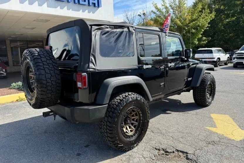2013 Jeep Wrangler Unlimited Sport photo 1