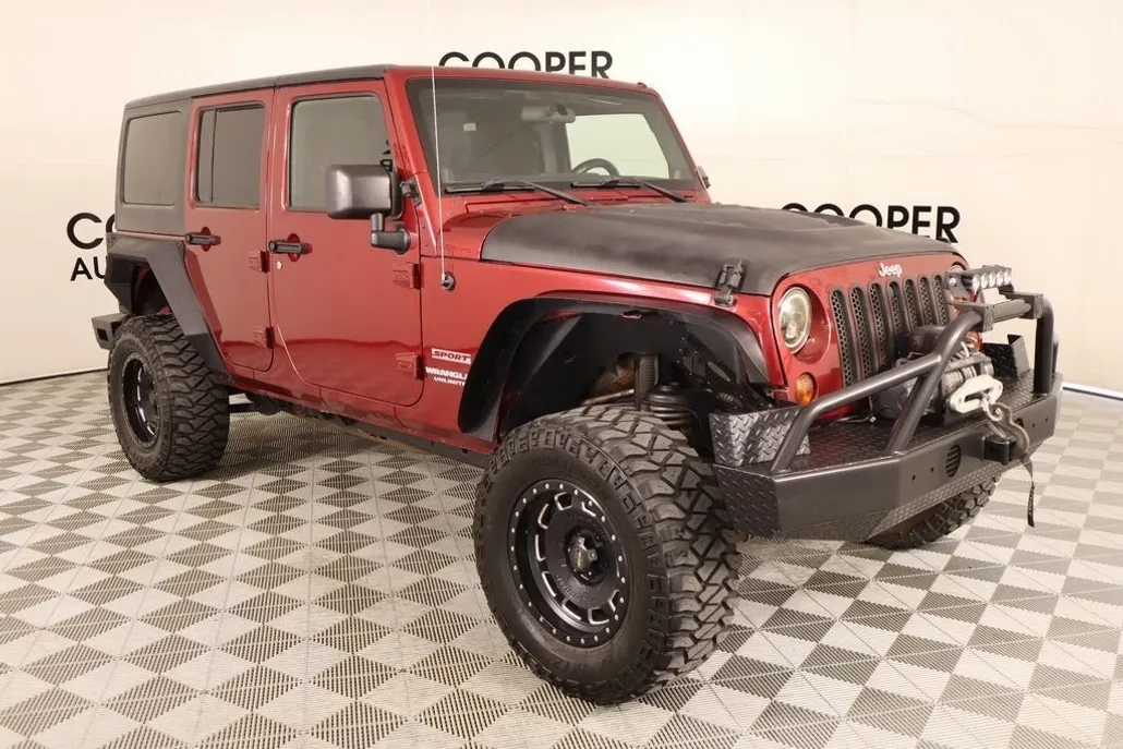 2013 Jeep Wrangler Unlimited Sport photo 1