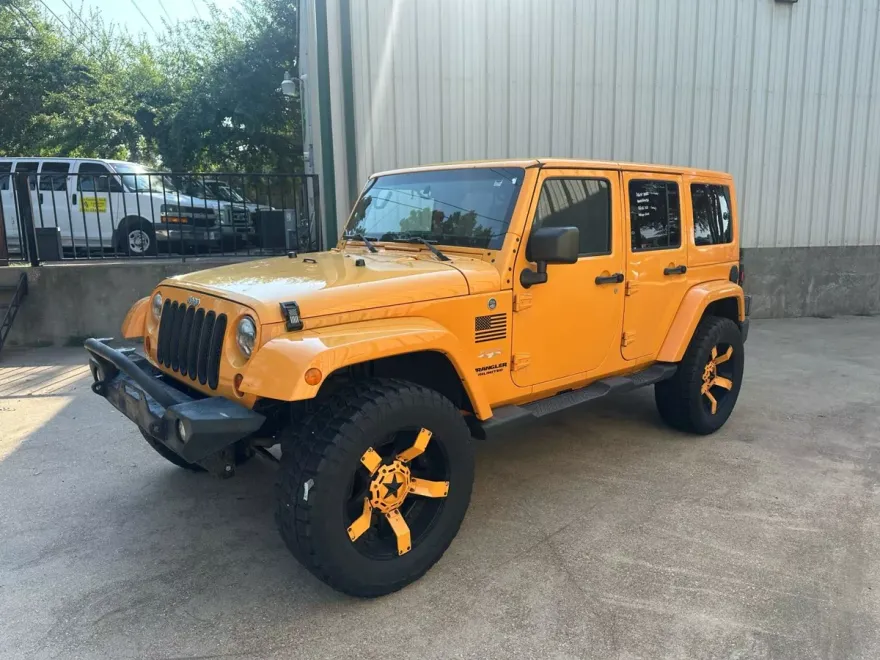 2012 Jeep Wrangler Unlimited Sahara Sport photo 1