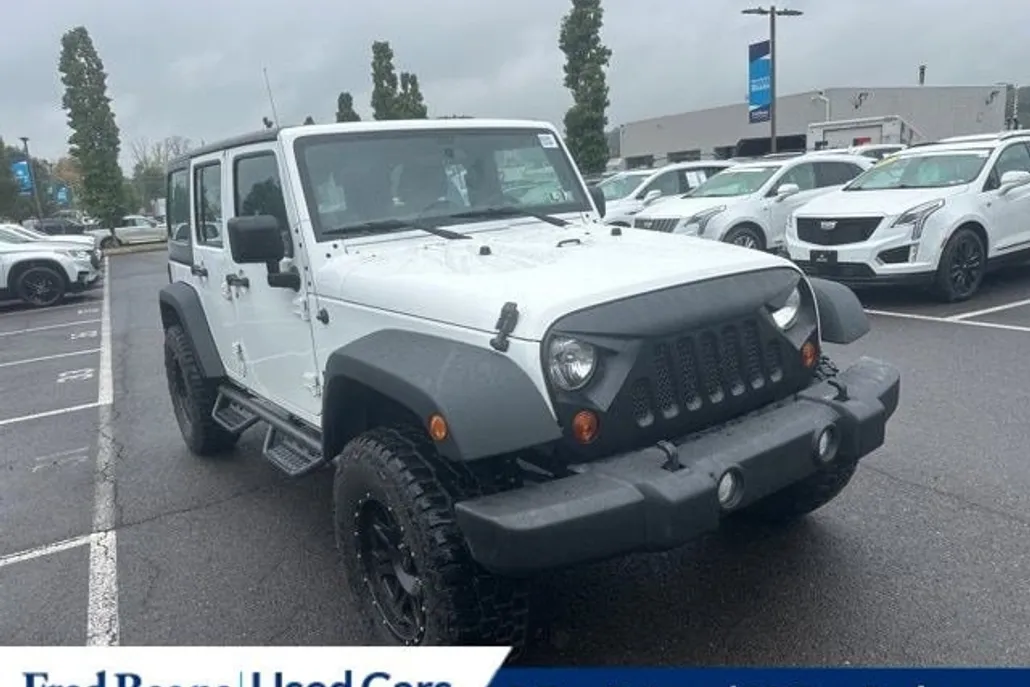 2013 Jeep Wrangler Unlimited Sport photo 1