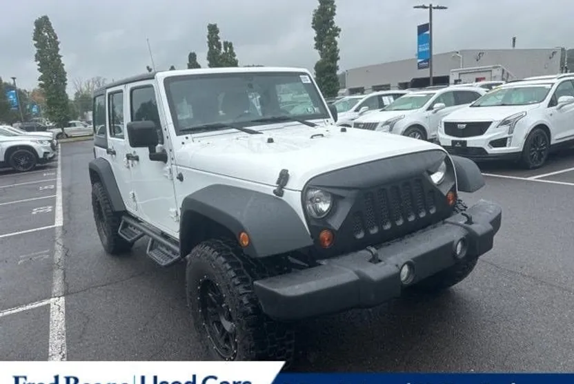 2013 Jeep Wrangler Unlimited Sport photo 1