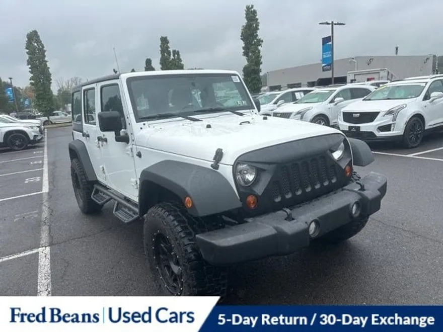 2013 Jeep Wrangler Unlimited Sport photo 1