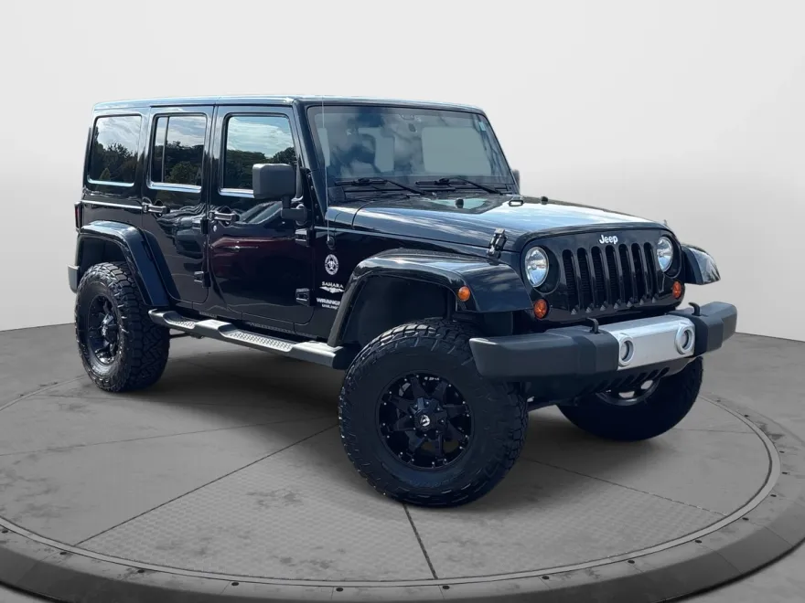 2013 Jeep Wrangler Unlimited Sahara photo 1