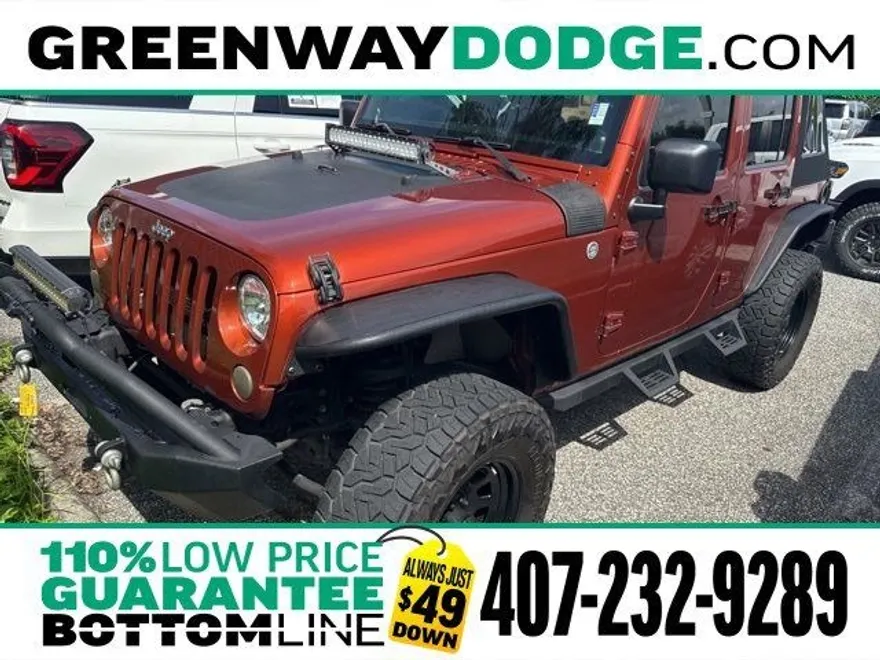 2014 Jeep Wrangler Unlimited Sport photo 1