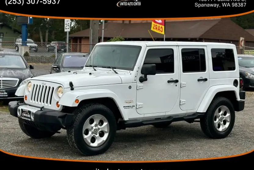 2013 Jeep Wrangler Unlimited Sahara Sport photo 1