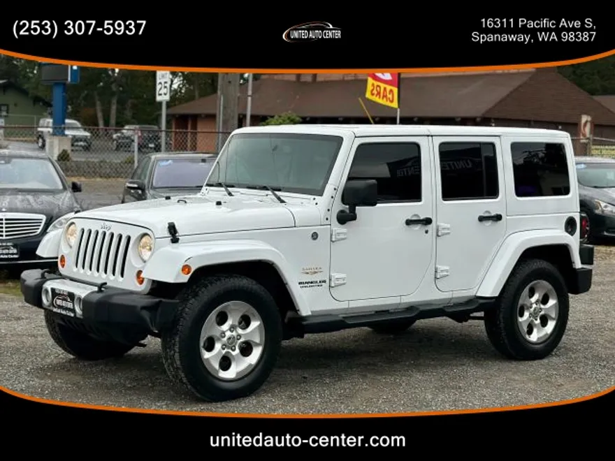 2013 Jeep Wrangler Unlimited Sahara Sport photo 1
