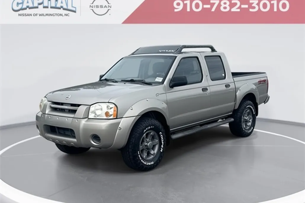 2004 Nissan Frontier XE Crew Cab photo 1
