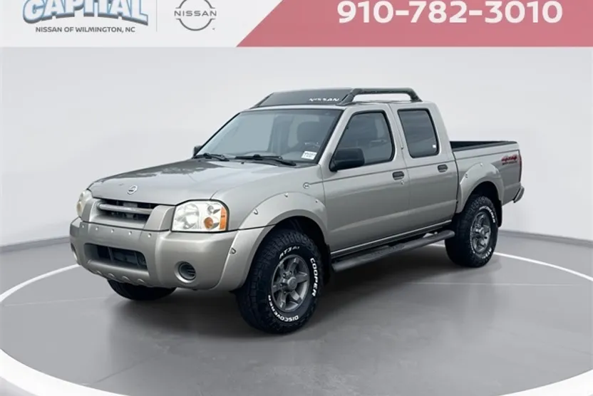 2004 Nissan Frontier XE Crew Cab photo 1