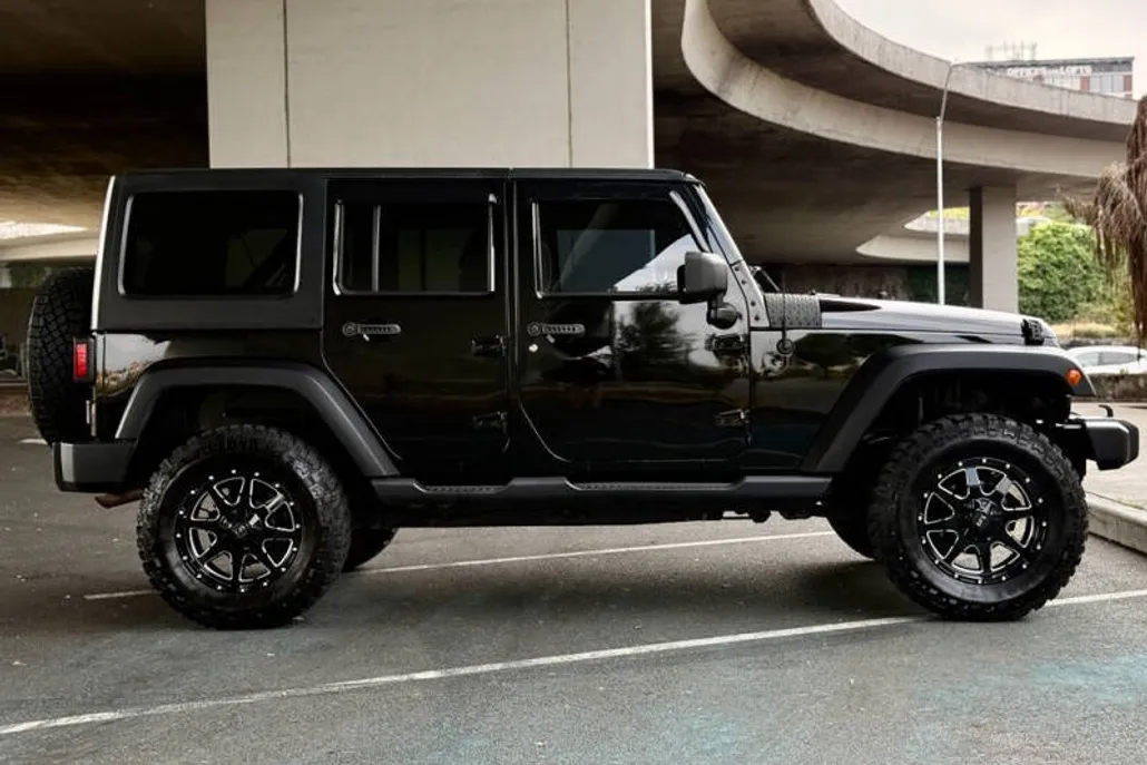 2013 Jeep Wrangler Unlimited Sport photo 1