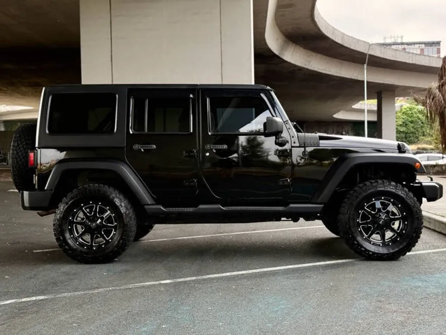 2013 Jeep Wrangler Unlimited Sport photo 1