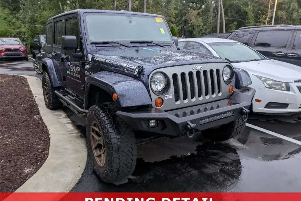 2013 Jeep Wrangler Unlimited Freedom photo 1