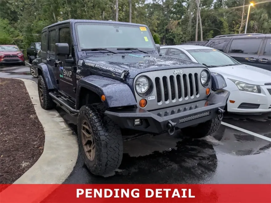 2013 Jeep Wrangler Unlimited Freedom photo 1