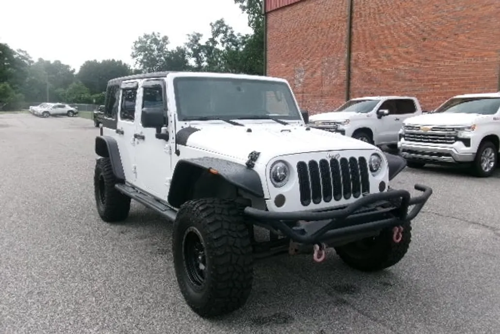 2013 Jeep Wrangler Unlimited Sport photo 1