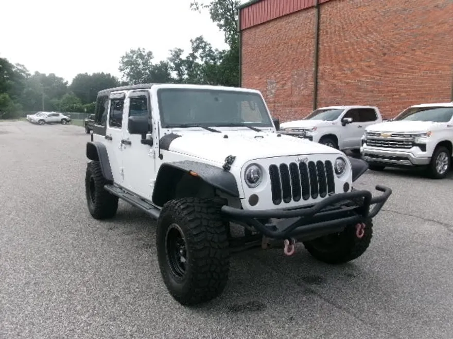 2013 Jeep Wrangler Unlimited Sport photo 1